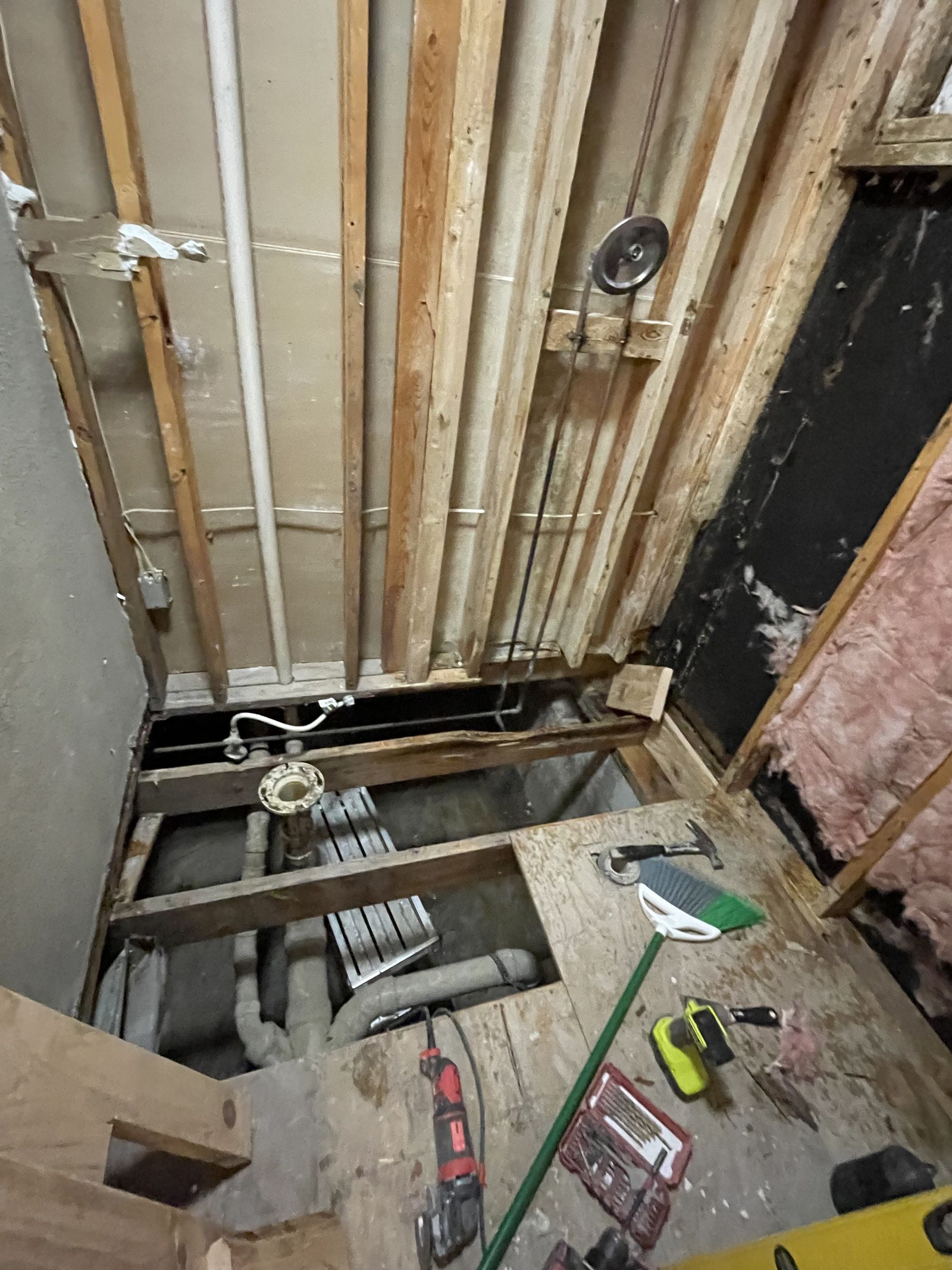 Walls open, plumbing and electrical run before a sheet of drywall goes on.
